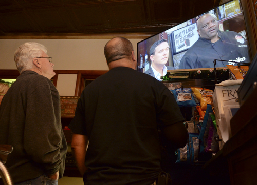 Katie Rickman | The Vindicator.John Kennedy, owner of the Royal Oak on right stands next to Tim Marucci of Youngstown as they watched the premiere of Bar Rescue Sunday night.