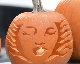 Katie Rickman | The Vindicator.A jack-o'-lantern is lit and was on display during the 12th Annual Pumpkin Walk at Twilight at Fellows Riverside Gardens Sunday evening.