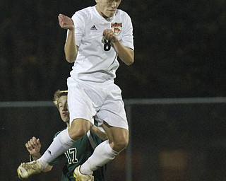 William D Lewis The Vindicator Howland's Christian Nogay(8) heads the ball past Nordonia's Mark Kaczmarek(17) during 1--21-15 action at Howland.