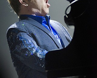 Katie Rickman | The Vindicator.Elton John sings his song Funeral for a Friend/Love Lies Bleeding during the opening of his concert at the Covelli Centre Saturday, February 1, 2014.