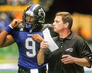 April 9, 2009.GOOD WORDS - Mike Hold talks with QB Davon Vinson during second quarter action - at the Chevy Centre Thunder opener..