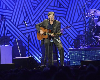 Katie Rickman | The Vindicator.Grammy Award winner James Taylor closes his eyes as he sings one of the opening songs at the Covelli Centre Monday, August  3, 2015.