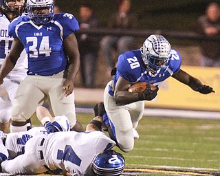William D Lewis The Vindicator Hubbard's Brandon Rios(20) is stopped by Poland's Dylan Garver(4) during 1rst half action in Hubbard 10-23-15.