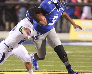 William D Lewis The Vindicator  Hubbard's Cam Ingram(5) is stopped byPoland's Nick Romeo(26) during 102315 action in Hubbard.