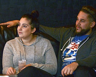 Katie Rickman | the Vindicator.Lauren Hunkus and Bobby Prodnick Jr. sit on a couch at The Federal Sunday night while watching the premiere of the show Bar Rescue.
