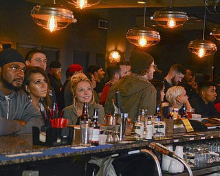 Katie Rickman | the Vindicator.A group gathered at the bar to watch the premiere of the show Bar Rescue at The Federal downtown Youngstown Sunday night.