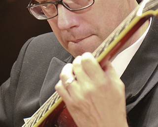 William D Lewis The Vindicator  US Navy Band Commodores Jazz Ensemble guitarist Shawn Purcell of Pittsburgh plays during a 10-26-15 concert at Stambaugh auditoriun in Youngstown.