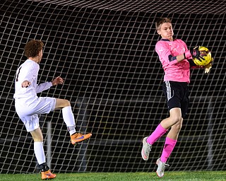NORTH LIMA, OHIO - OCTOBER 27, 2015: Scott Murray #00 of Crestview makes a save before Brooks Thomas #1 of South Range can play a rebound in front of the net during the 1st half of a game Tuesday night at the old South Range High School. DAVID DERMER | THE VINDICATOR
