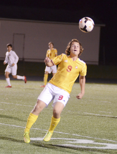 Katie Rickman | The Vindicator.Mooney's Paul Graziano (#9) watches as a ball passed to him comes closer during the second half of the game at Canfield High School on Wednesday, October 28, 2015.