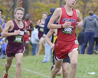 Katie Rickman | The Vindicator.Girard's Derek Bassinger crossed the finish line in 47th place during the District II cross country meet at Boardman High School on Saturday afternoon.