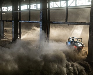 At first glance, it could be a scene from a "Mad Max" video..But the video released Tuesday by Mad Media - showing professional off-road stunt driver R.J. Anderson tearing through a bleak, post-apocalyptic landscape - was shot in Youngstown, Warren and other Mahoning Valley locations.