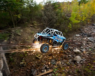 At first glance, it could be a scene from a "Mad Max" video..But the video released Tuesday by Mad Media - showing professional off-road stunt driver R.J. Anderson tearing through a bleak, post-apocalyptic landscape - was shot in Youngstown, Warren and other Mahoning Valley locations.