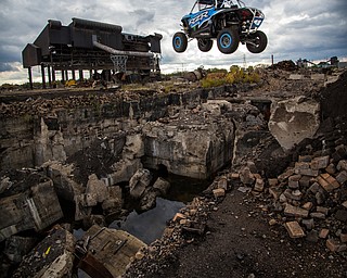 At first glance, it could be a scene from a "Mad Max" video..But the video released Tuesday by Mad Media - showing professional off-road stunt driver R.J. Anderson tearing through a bleak, post-apocalyptic landscape - was shot in Youngstown, Warren and other Mahoning Valley locations.