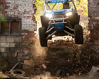 At first glance, it could be a scene from a "Mad Max" video..But the video released Tuesday by Mad Media - showing professional off-road stunt driver R.J. Anderson tearing through a bleak, post-apocalyptic landscape - was shot in Youngstown, Warren and other Mahoning Valley locations.