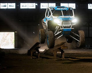 At first glance, it could be a scene from a "Mad Max" video..But the video released Tuesday by Mad Media - showing professional off-road stunt driver R.J. Anderson tearing through a bleak, post-apocalyptic landscape - was shot in Youngstown, Warren and other Mahoning Valley locations.