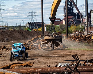 At first glance, it could be a scene from a "Mad Max" video..But the video released Tuesday by Mad Media - showing professional off-road stunt driver R.J. Anderson tearing through a bleak, post-apocalyptic landscape - was shot in Youngstown, Warren and other Mahoning Valley locations.