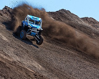 At first glance, it could be a scene from a "Mad Max" video..But the video released Tuesday by Mad Media - showing professional off-road stunt driver R.J. Anderson tearing through a bleak, post-apocalyptic landscape - was shot in Youngstown, Warren and other Mahoning Valley locations.