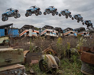 At first glance, it could be a scene from a "Mad Max" video..But the video released Tuesday by Mad Media - showing professional off-road stunt driver R.J. Anderson tearing through a bleak, post-apocalyptic landscape - was shot in Youngstown, Warren and other Mahoning Valley locations.