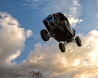 At first glance, it could be a scene from a "Mad Max" video..But the video released Tuesday by Mad Media - showing professional off-road stunt driver R.J. Anderson tearing through a bleak, post-apocalyptic landscape - was shot in Youngstown, Warren and other Mahoning Valley locations.