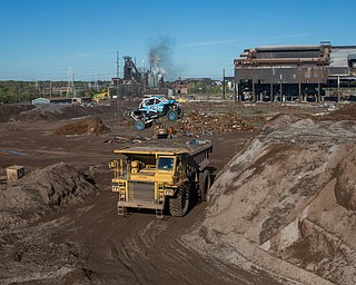 At first glance, it could be a scene from a "Mad Max" video..But the video released Tuesday by Mad Media - showing professional off-road stunt driver R.J. Anderson tearing through a bleak, post-apocalyptic landscape - was shot in Youngstown, Warren and other Mahoning Valley locations.