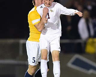 SANDUSKY, OHIO - NOVEMBER 11, 2015: Brooks Thomas #1 of South Range heads the ball away from Austin Welch #5 of Archbold during the 1st half of Wednesday nights State Semi-Final game at Cedar Point Stadium. Out Range won 1-0. DAVID DERMER | THE VINDICATOR
