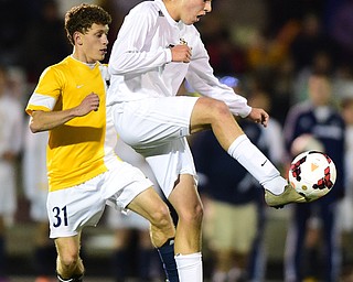 SANDUSKY, OHIO - NOVEMBER 11, 2015: Brandon Youngs #10 of South Range plays the ball while being pressured by Kegan Ott #31 of Archbold during the 1st half of Wednesday nights State Semi-Final game at Cedar Point Stadium. Out Range won 1-0. DAVID DERMER | THE VINDICATOR
