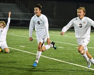 SANDUSKY, OHIO - NOVEMBER 11, 2015: Landon Baer #6 and Cole Frank #3 of South Range run off the field in celebration after time expired during Wednesday nights State Semi-Final game at Cedar Point Stadium. Out Range won 1-0. DAVID DERMER | THE VINDICATOR..Brooks Thomas #1 pictured.