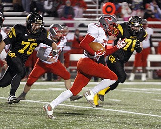       .         ROBERT  K. YOSAY | THE VINDICATOR..LaBrae #22  Arjay Oliver  heads for a TD after a as Crestview #76  Landon Talbert and #70 Jack DavisLaBrae VS Crestview..-30-