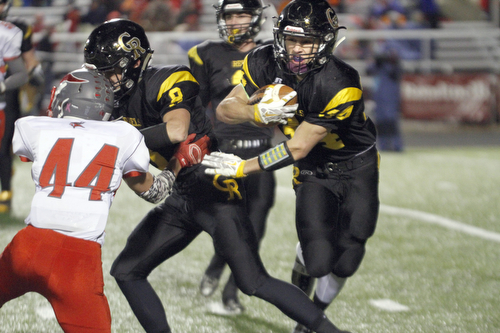       .         ROBERT  K. YOSAY | THE VINDICATOR..Crestviews #34 Zach Hicks breaks for big yardage during first quarter action as #8 Tyler Fitzsimmons blocks #44 LaBrae  Keevon Harris ..LaBrae VS Crestview..-30-