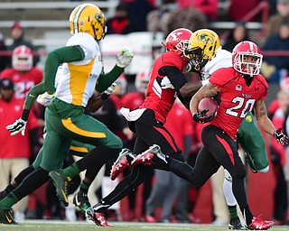 YOUNGSTOWN, OHIO - NOVEMBER 14, 2015: Jody Webb #20 of YSU breaks into the open field before sprinting into the end zone to score a touchdown during the 1st half of their game at Stambaugh Stadium Saturday afternoon. DAVID DERMER | THE VINDICATOR