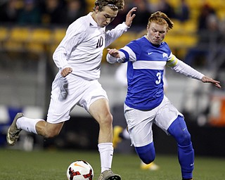 Canfield South Range's Brandon Youngs, left, works for the ball against  Cincinnati Summit Country Day's Rielly Dowling during the first half of the boys Division III Ohio State Soccer Championship Saturday, Nov. 14, 2015, in Columbus, Ohio. (Photo/Paul Vernon)