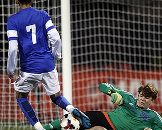 Canfield South Range goalie Brant Rothbauer, right, stops a shot by  Cincinnati Summit Country Day's Cameron Belle during the first half of the boys Division III Ohio State Soccer Championship Saturday, Nov. 14, 2015, in Columbus, Ohio. (Photo/Paul Vernon)