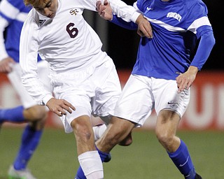 Canfield South Range's Landon Baer, left, works for the ball against Cincinnati Summit Country Day's Jacob Beardslee during the second half of the boys Division III Ohio State Soccer Championship Saturday, Nov. 14, 2015, in Columbus, Ohio. Cincinnati Summit Country Day won 9-0. (Photo/Paul Vernon)