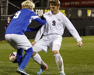Canfield South Range's Michael Kuhns, right, works for the ball against  Cincinnati Summit Country Day's Charlie Maciejewski during the second half of the boys Division III Ohio State Soccer Championship Saturday, Nov. 14, 2015, in Columbus, Ohio. Cincinnati Summit Country Day won 9-0. (Photo/Paul Vernon)
