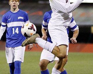 Canfield South Range's Brandon Youngs (10), right, passes the ball in front of  Cincinnati Summit Country Day's Alex Hertlein (5) and Brendan Ochs (14) during the second half of the boys Division III Ohio State Soccer Championship Saturday, Nov. 14, 2015, in Columbus, Ohio. Cincinnati Summit Country Day won 9-0. (Photo/Paul Vernon)