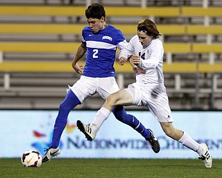 Canfield South Range's Lucas Beabout, right, works for the ball against Cincinnati Summit Country Day's David Cook  during the second half of the boys Division III Ohio State Soccer Championship Saturday, Nov. 14, 2015, in Columbus, Ohio. Cincinnati Summit Country Day won 9-0. (Photo/Paul Vernon)