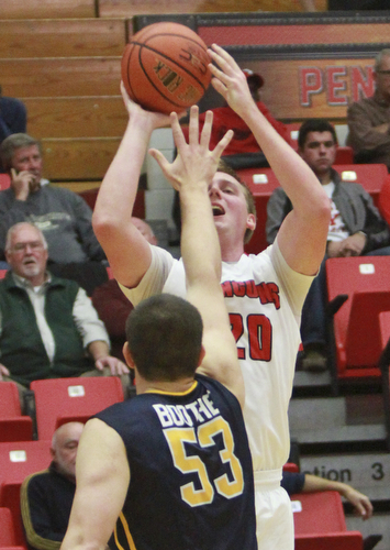 William D Lewis the VindicatorYSU's Bobby Haim(20) shootsover Toledo's NAthan Boothe during 11-18-15 action at YSU.