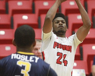 William d Lewis The Vindicator YSU Cameron Morse(24)  shoots over Toledo's Stuckey Mosley during 11182015 action at YSU.