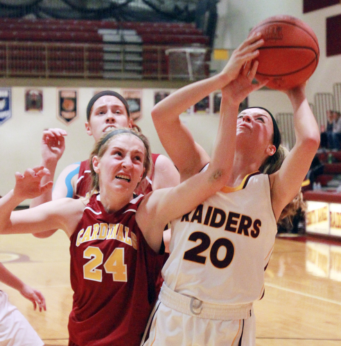 William D. Lewis The Vindicator  SR's Morgan Czopur(20) shoots past Mooney's Kelly Williams(24) during 12-3-15 action at SR.