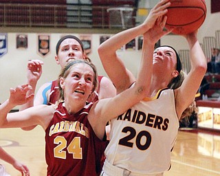 William D. Lewis The Vindicator  SR's Morgan Czopur(20) shoots past Mooney's Kelly Williams(24) during 12-3-15 action at SR.