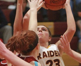William D. Lewis The Vindicator  SR's Taylor Naples(23) shoots over Mooney's Maggie Monahan(32) during 12-3-15 action at SR.