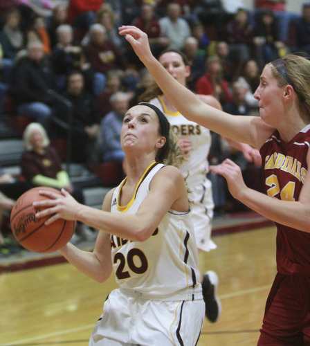 William D. Lewis The Vindicator  SR's Morgan Czopur(20) shoots past Mooney's Kelly Williams(24) during 12-3-15 action at SR.