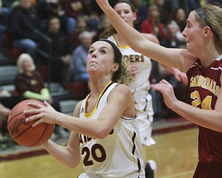 William D. Lewis The Vindicator  SR's Morgan Czopur(20) shoots past Mooney's Kelly Williams(24) during 12-3-15 action at SR.