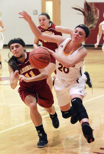 William D. Lewis The Vindicator  SR's Morgan Czopur(20) drives past Mooney's Reneesantisi (11) during 12-3-15 action at SR.