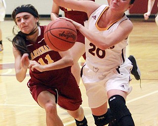William D. Lewis The Vindicator  SR's Morgan Czopur(20) drives past Mooney's Reneesantisi (11) during 12-3-15 action at SR.