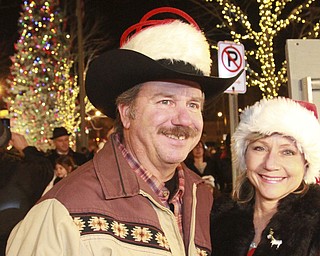 William d Lewis The Vindicator 2015 Younstown ChristmasParade12-4-15..T.A. Brown and his wife Laura Brown donated a pinetree from their home on Brunswick Rd to the city for use  as 2015 christmastree.