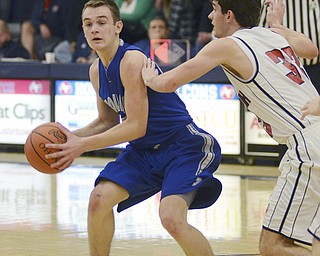 Katie Rickman | The Vindicator.Poland's Jared Burkert (#23) looks for an open pass as Fitch's Brian Beany (#33) guards him during the fourth period of the game at Fitch High School on Tuesday night.
