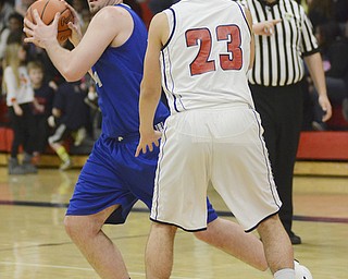Katie Rickman | The Vindicator.Poland's Jacob Burns (#14) looks for an open pass around Fitch's Dom DiFrancesio (SPELLING) (#23) during the game at Fitch High School on Tuesday night.