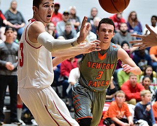 LEAVITTSBURG, OHIO - DECEMBER 22, 2015: Jason Downey #23 of Labrae passes the ball to a teammate after gaining possession away from Jaden Walton #3 of Newton Falls during the 1st half of their game Tuesday night at Labrae High School. DAVID DERMER | THE VINDICATOR