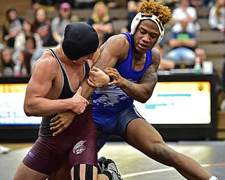 HOWLAND, OHIO - DECEMBER 23, 2015: Tyler Dempsey of Boardman controls the arm of Isiah Jackson of Fitch while the two wrestle on the mat during a 160lb bout Wednesday afternoon at Howland High School. DAVID DERMER | THE VINDICATOR